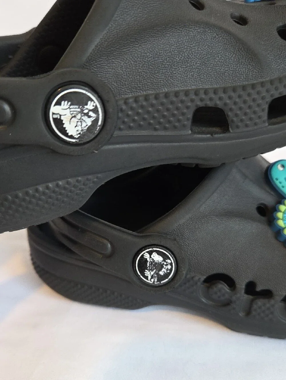 CROCS Black Kids' Clogs with Colorful Dino and Character Charms